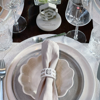 The STYLE COLLECTION HOME NAPKIN RING THE HAMPTONS WHITE AND SAND WHITE AND BEIGE