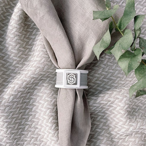 Close up front white and beige napkin ring with leather strap London collection by STYLE COLLECTION HOME