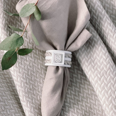The STYLE COLLECTION HOME NAPKIN RING THE HAMPTONS WHITE AND SAND WHITE AND BEIGE